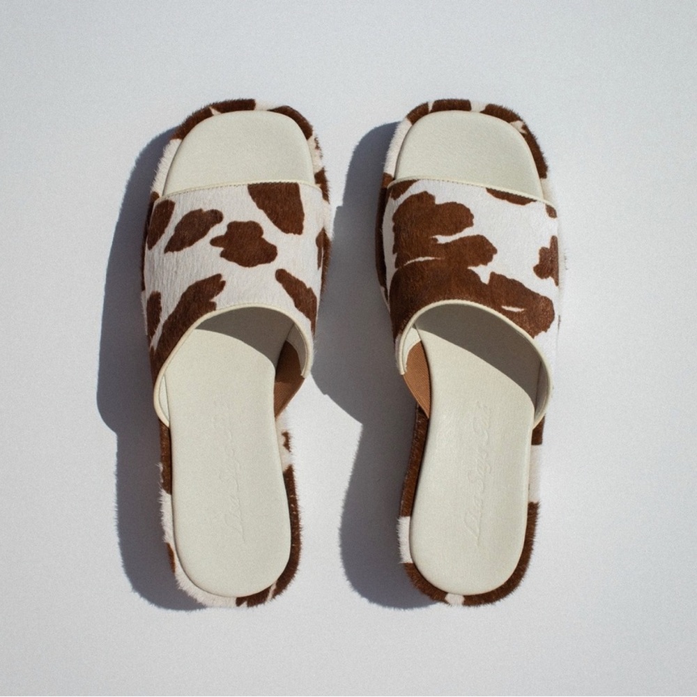 Lisa Says Gah Cow Print Sandals
